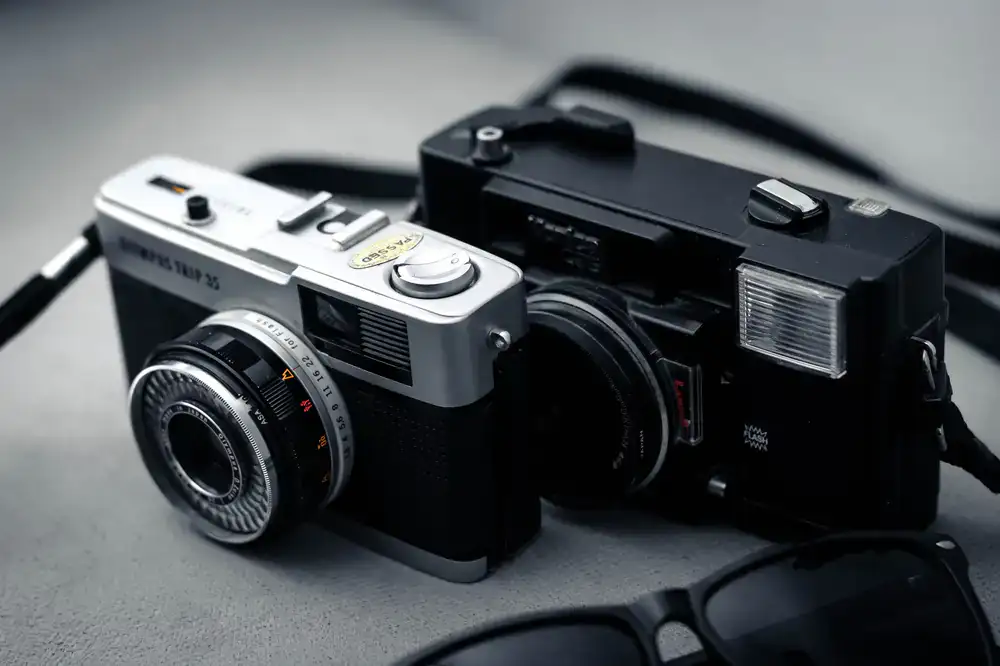 A silver vintage rangefinder camera