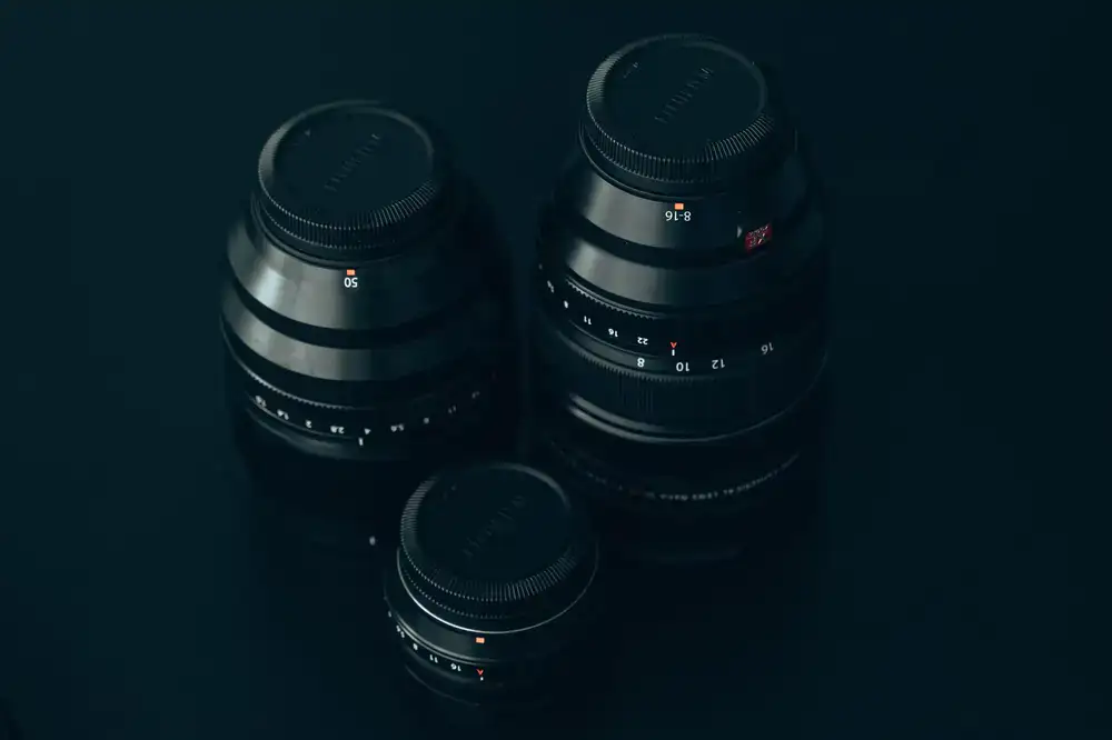 Row of fast prime lenses with metal barrels